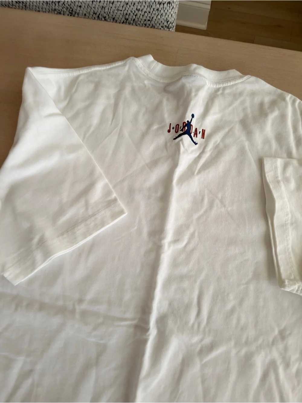 Jordan White Eastside Golf Tee with Center Golfer Graphic - Size XL
